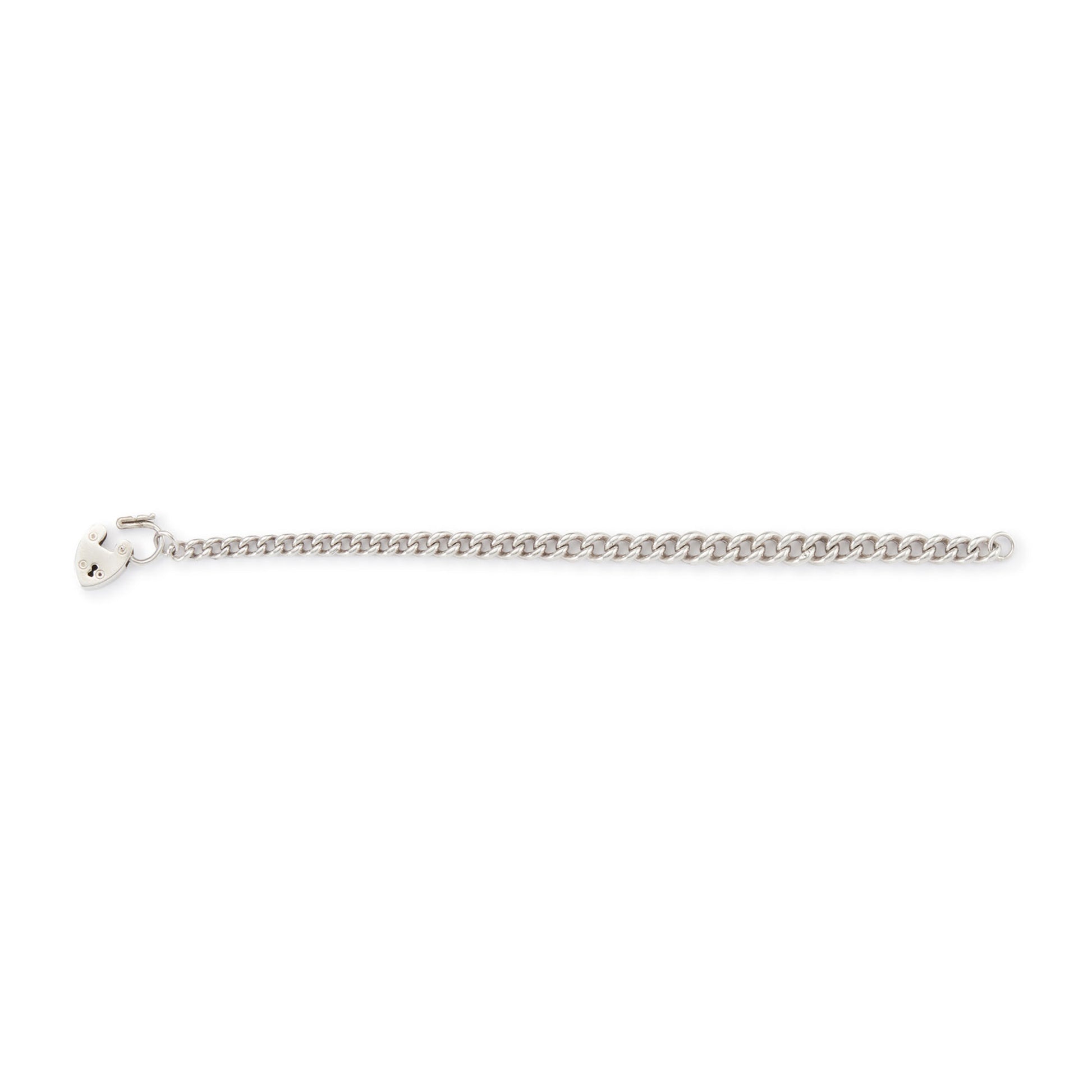 Classic silver Victorian curb link bracelet with solid, graduated links and a padlock. Every link is stamped.