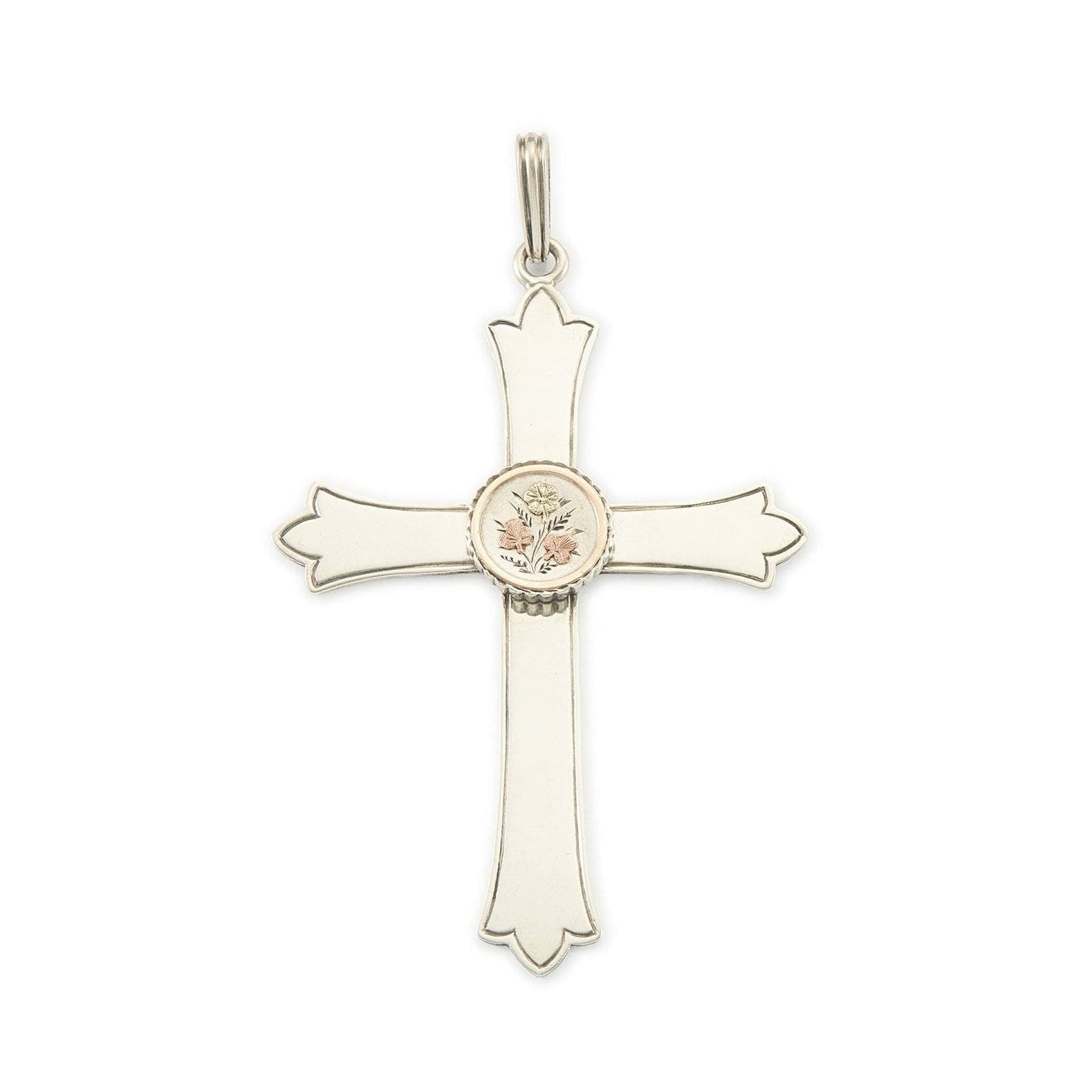Exquisite Victorian silver cross pendant with a gold embellished floral design centrepiece.