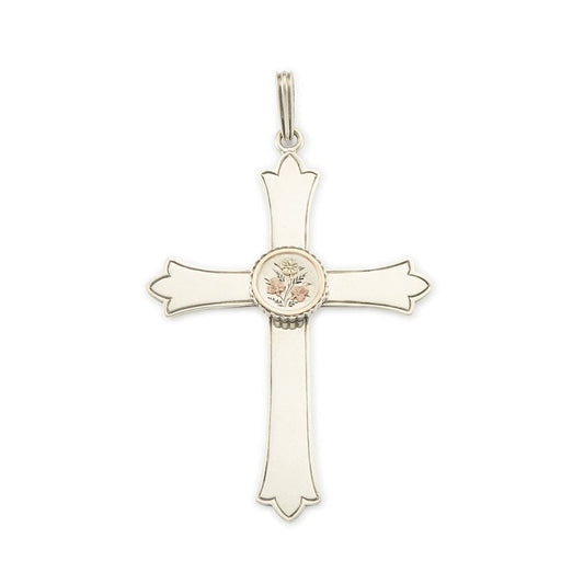 Exquisite Victorian silver cross pendant with a gold embellished floral design centrepiece.