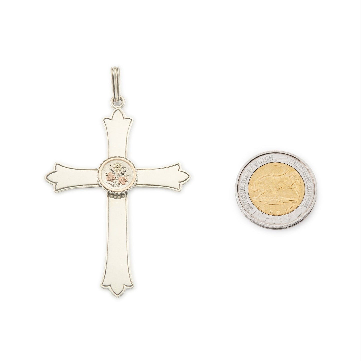 Exquisite Victorian silver cross pendant with a gold embellished floral design centrepiece.