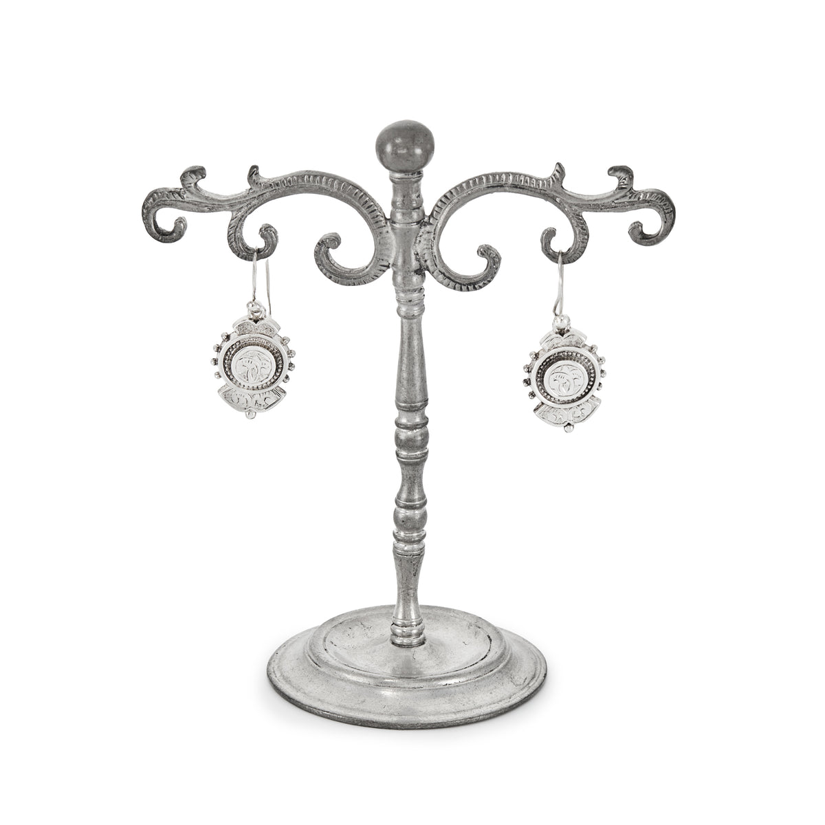Beautifully engraved silver Victorian dangling earrings with shepherd's hooks, accompanied by a brooch with the same design. 