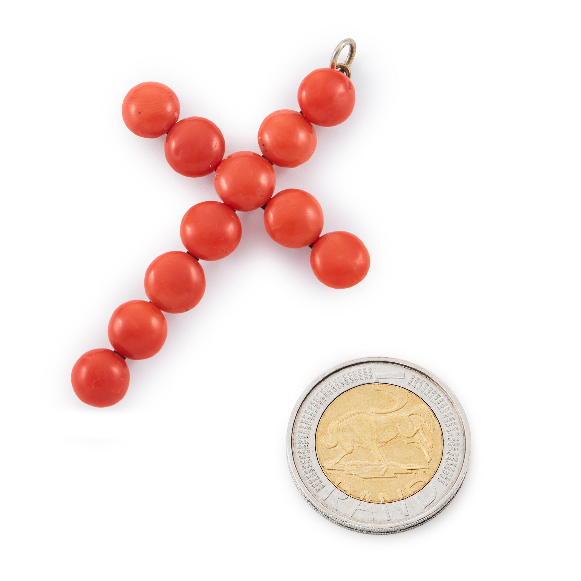 Sought after Victorian silver gilt cross pendant set with eleven natural Mediterranean coral pieces.