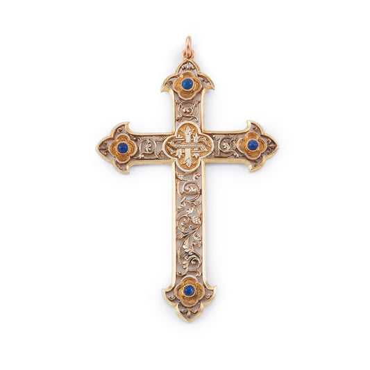 Ornately carved silver-gilt Victorian monogrammed cross pendant set with four lapis lazuli cabochon stones.