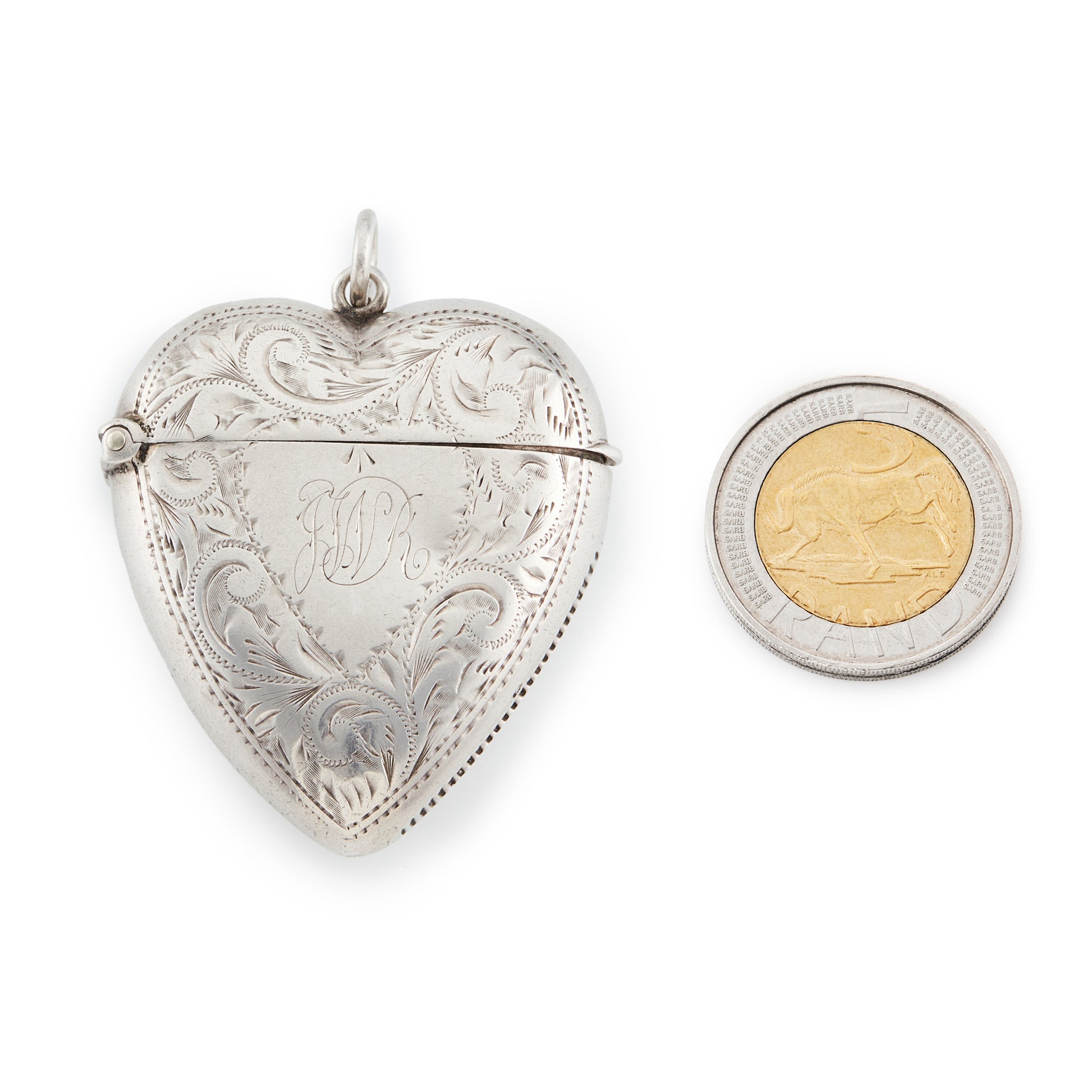 Beautifully engraved Victorian silver heart shaped vester locket.
