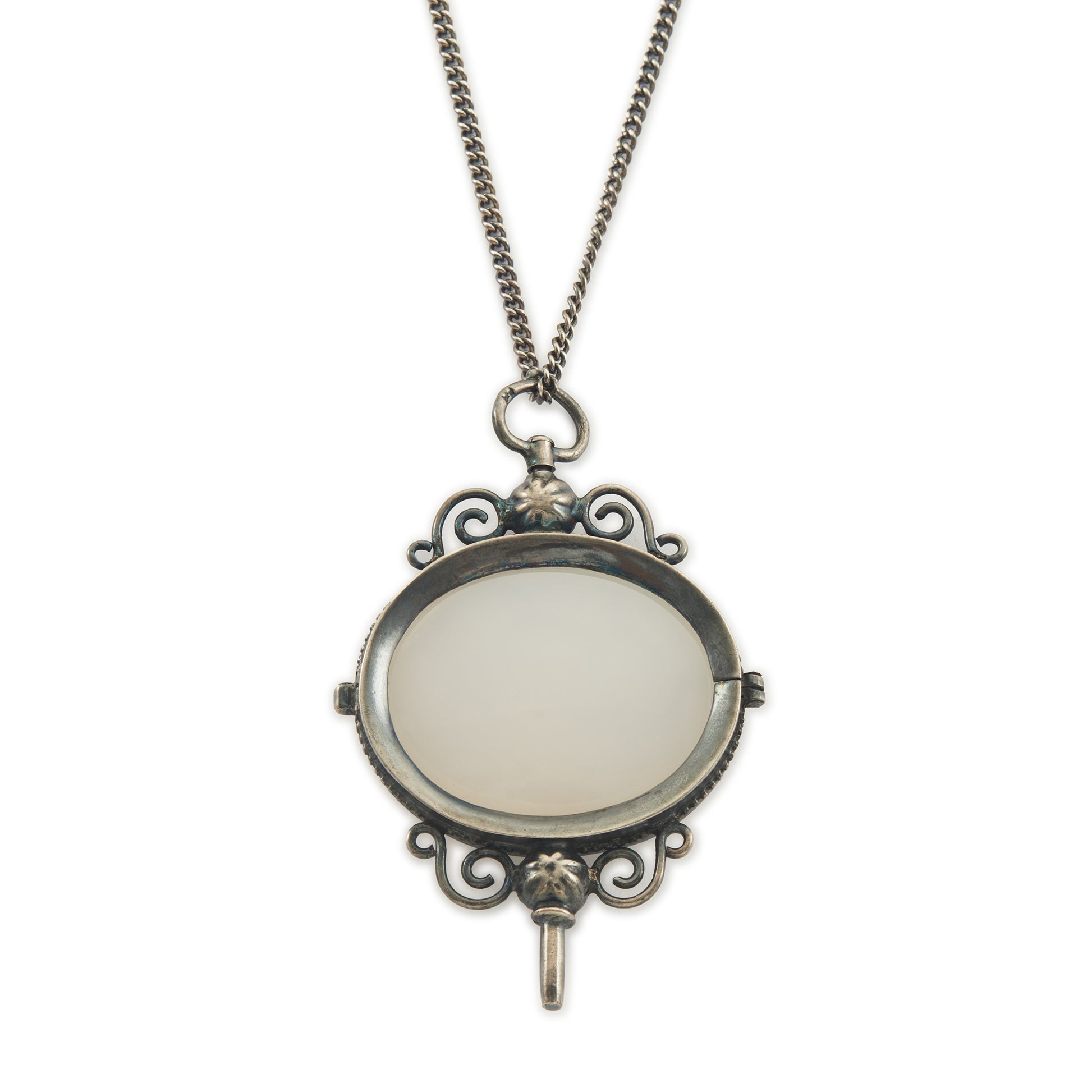 Charming Victorian oxidised silver and agate key winder pendant on a long chain.