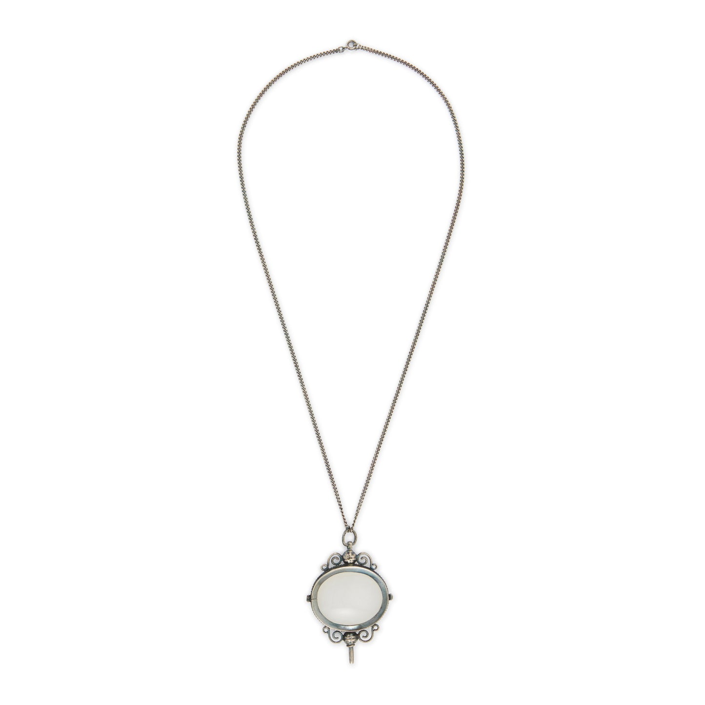 Charming Victorian oxidised silver and agate key winder pendant on a long chain.