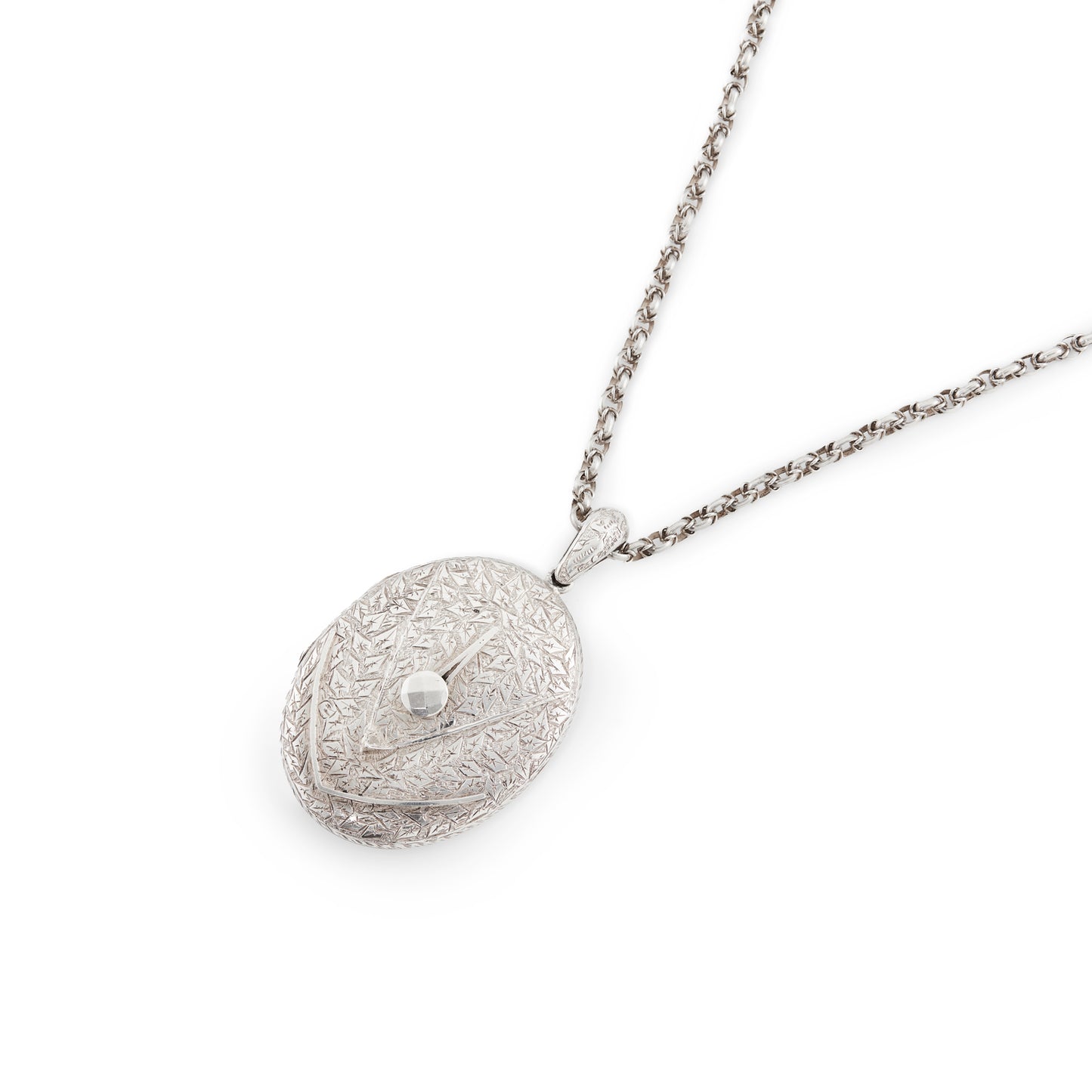 Beautifully engraved Victorian silver locket on an ornate silver chain with a barrel clasp.