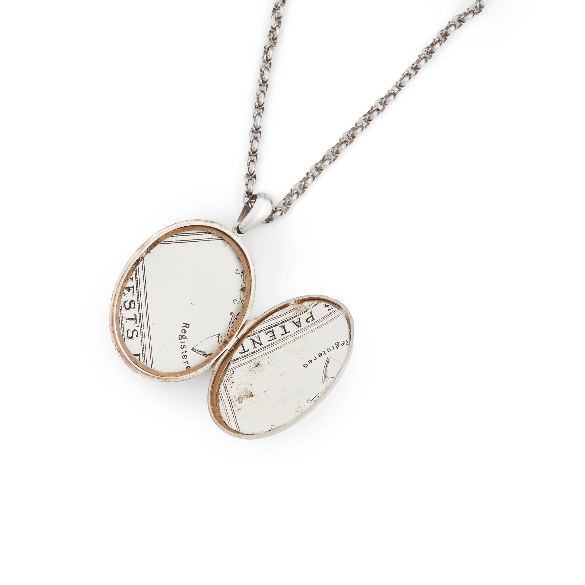 Beautifully engraved Victorian silver locket on an ornate silver chain with a barrel clasp.