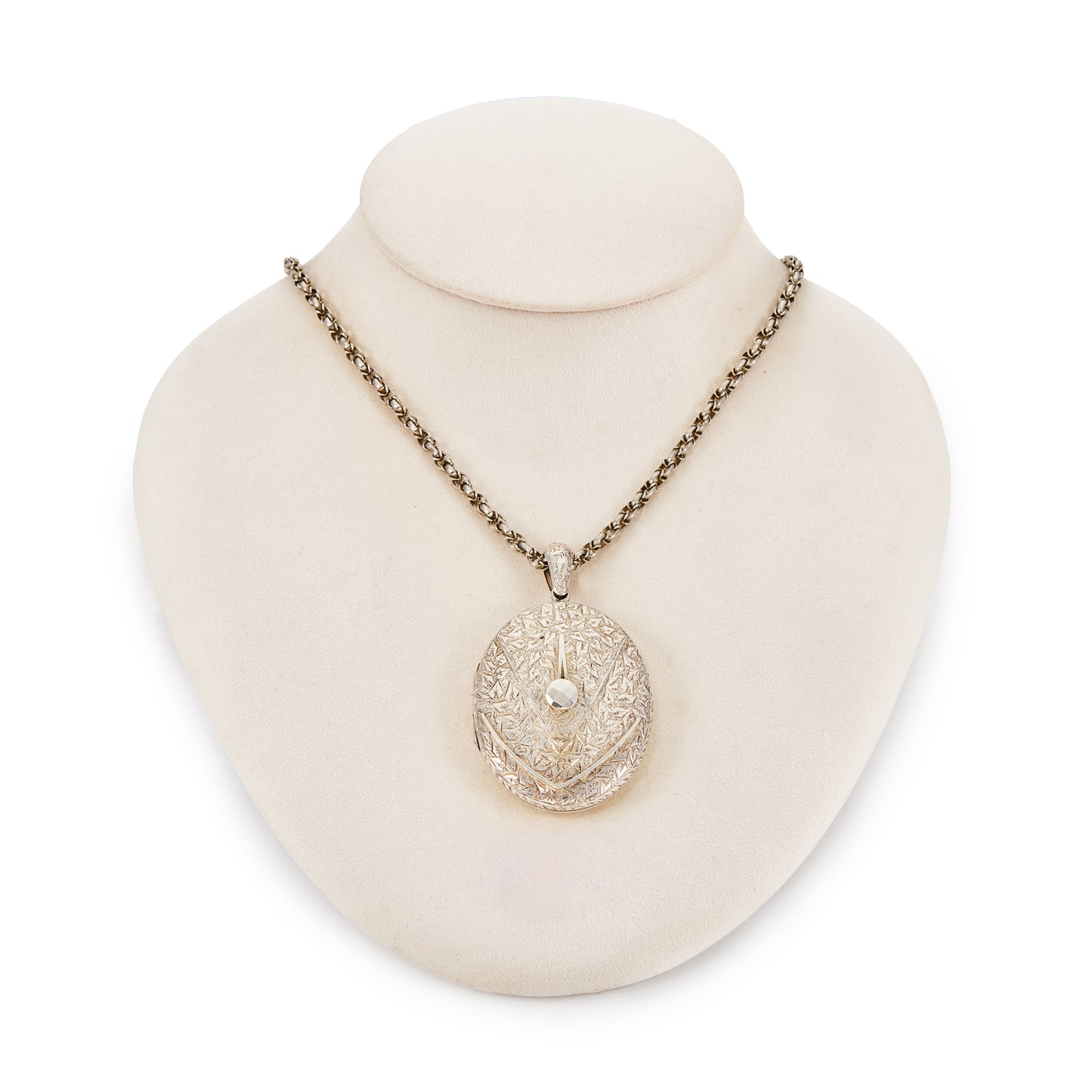 Beautifully engraved Victorian silver locket on an ornate silver chain with a barrel clasp.