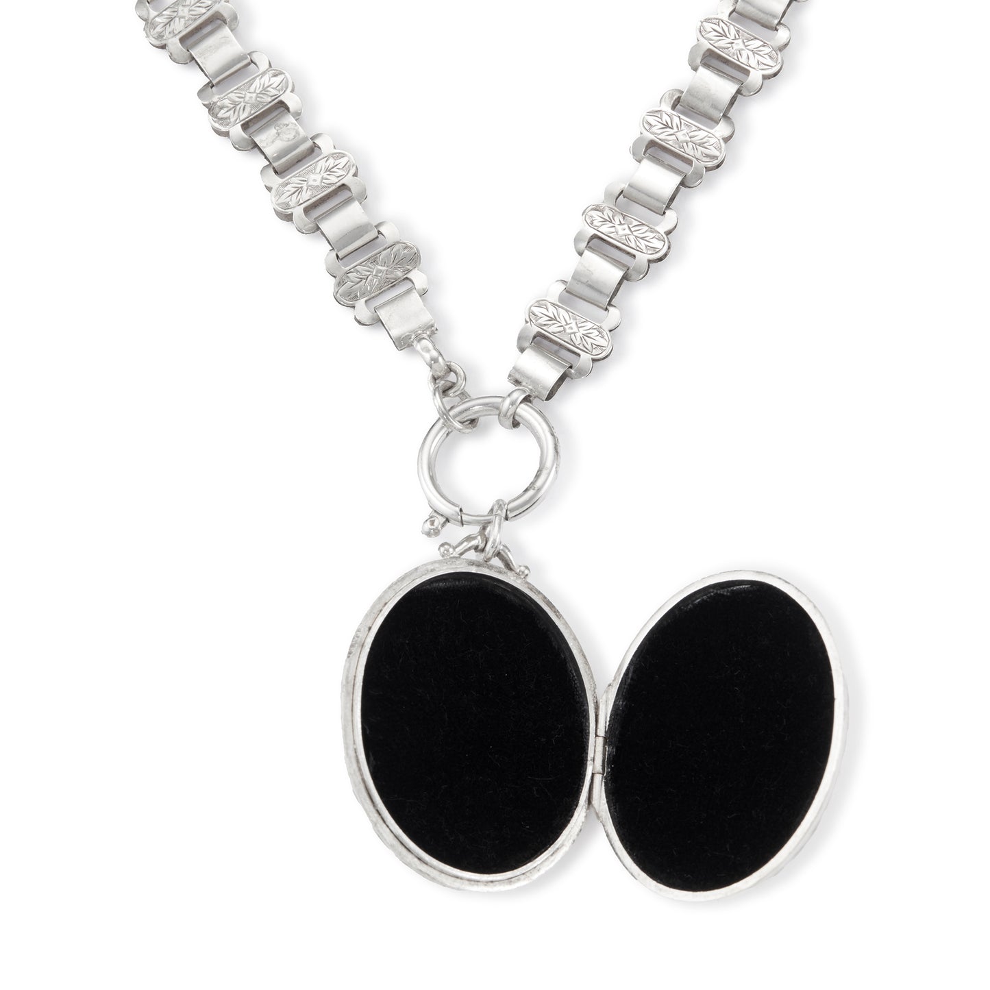 Classic Victorian silver locket on choker with ornate floral engraving.