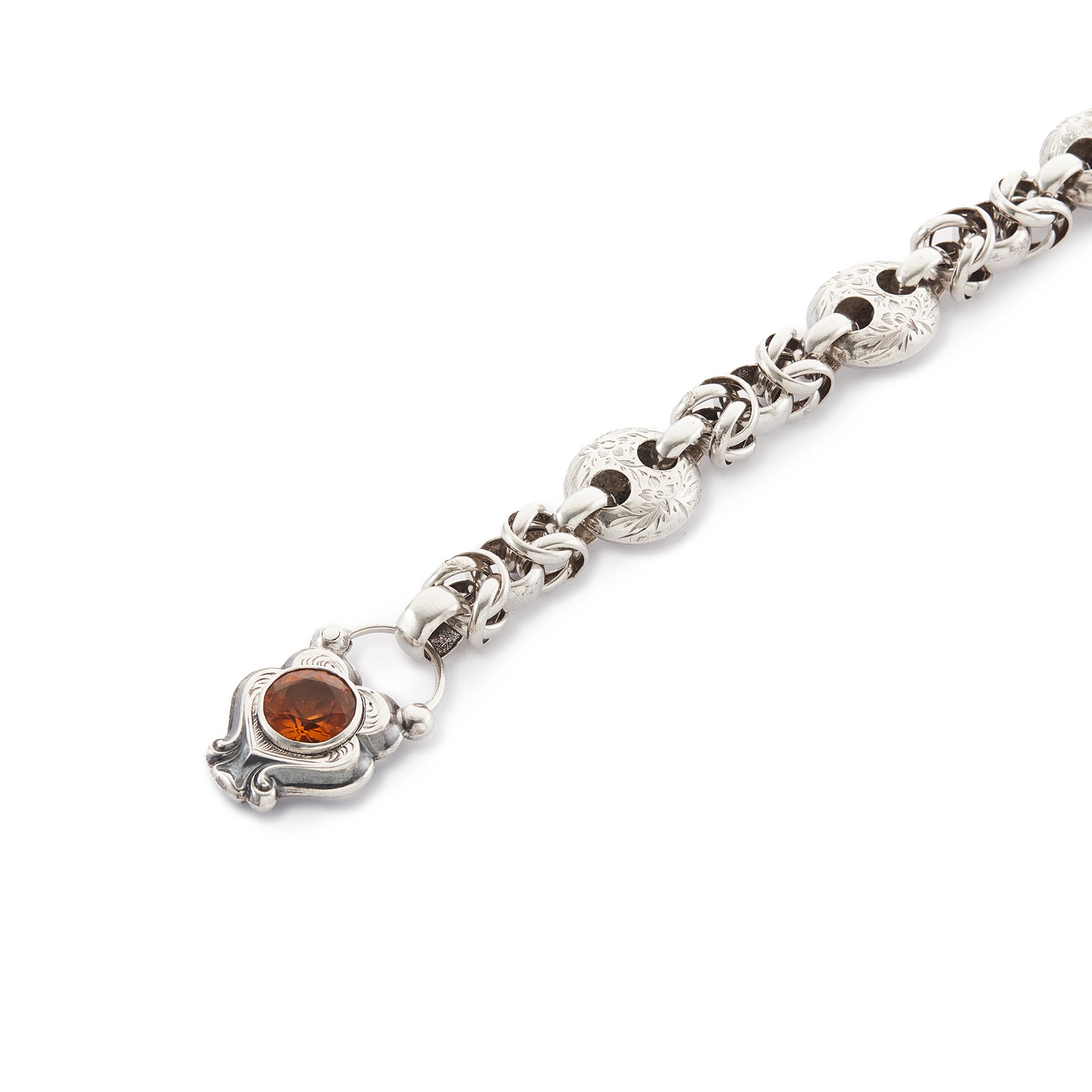 Stunning Scottish silver Victorian fancy link bracelet with a beautiful padlock set with a Cairngorm gemstone. The large links and padlock feature lovely floral engraving.