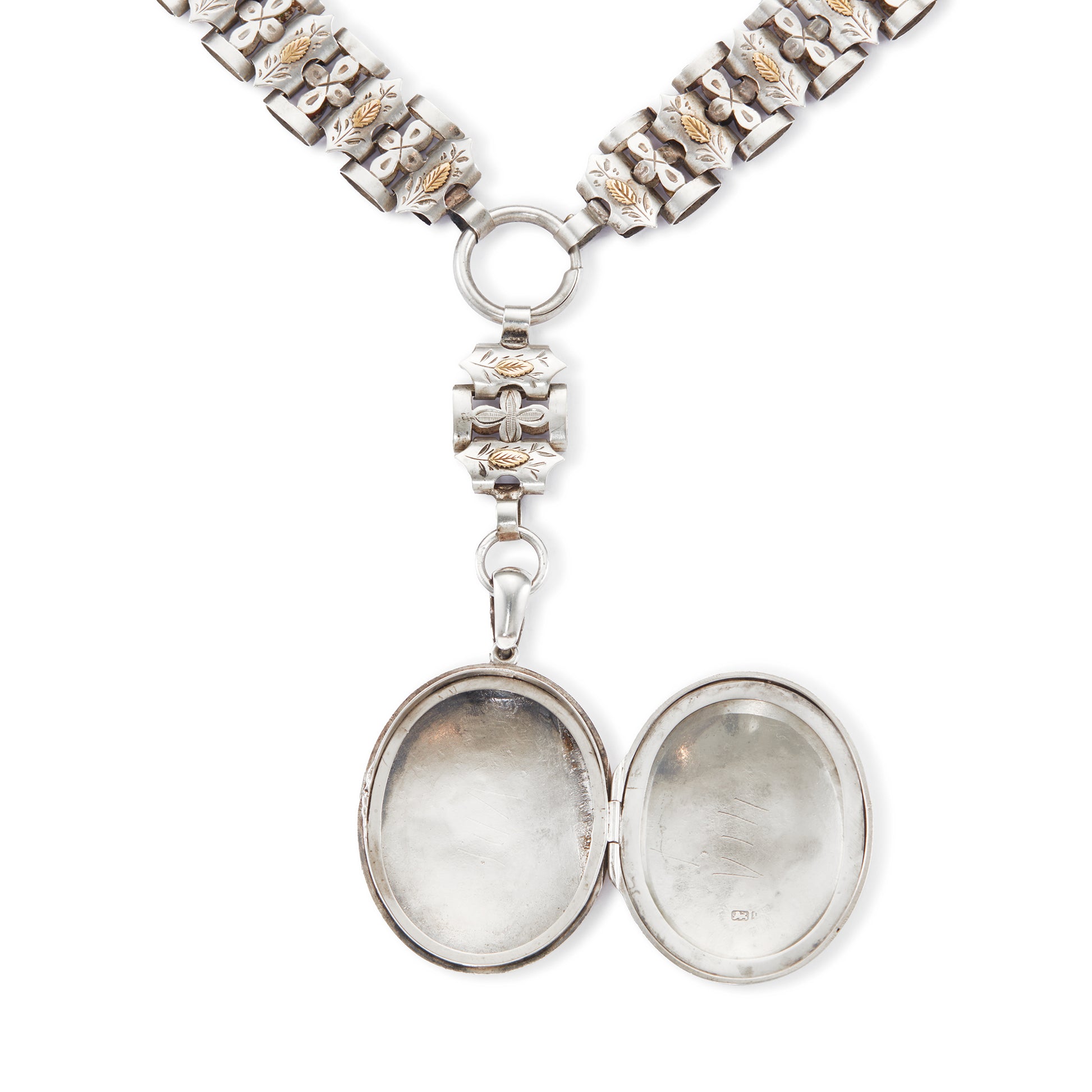 Stunning sterling silver Victorian locket on choker. Both the locket and choker are beautifully engraved with ornate gold detail. Locket takes two photographs and has one oval piece of glass on the inside of the frame. 