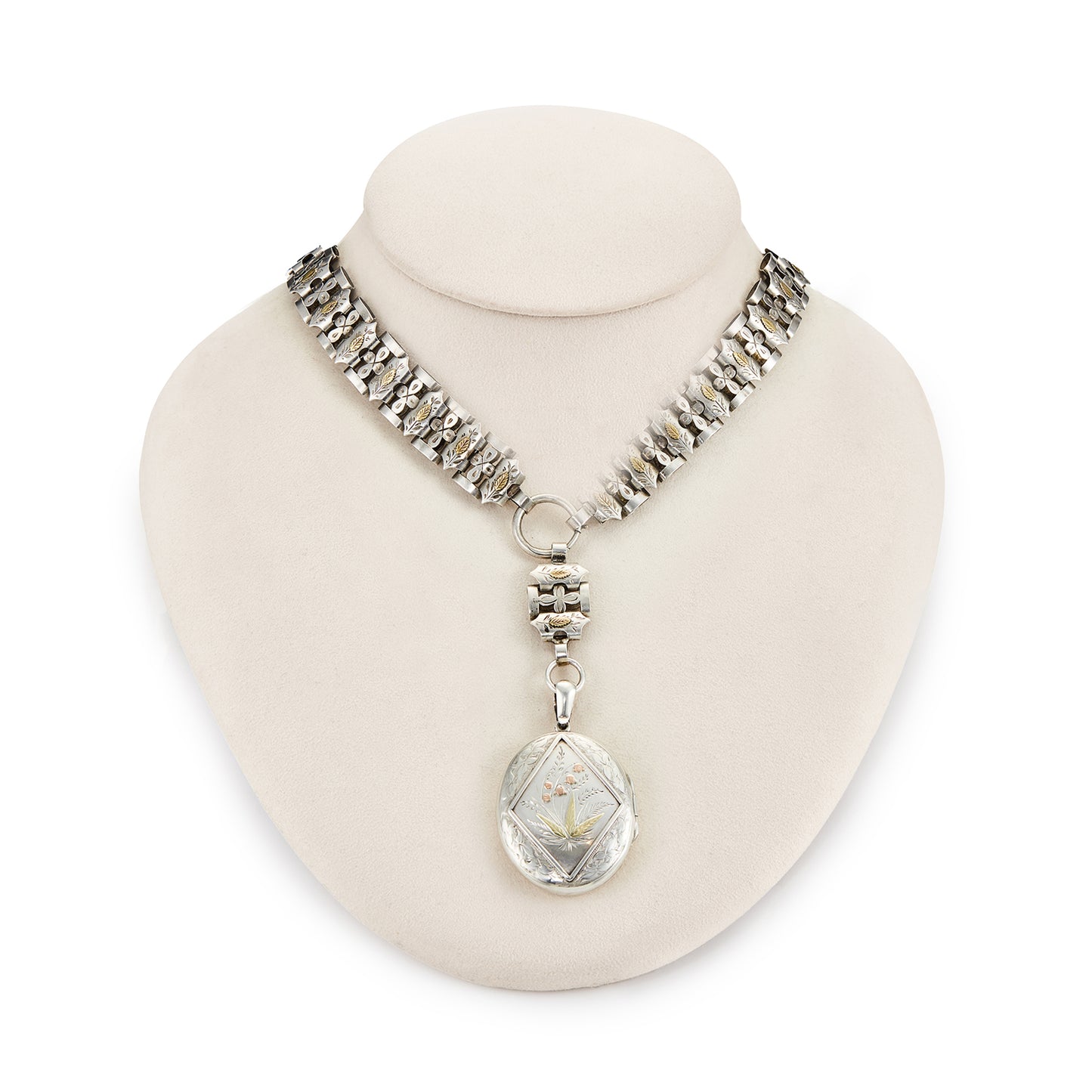 Stunning sterling silver Victorian locket on choker. Both the locket and choker are beautifully engraved with ornate gold detail. Locket takes two photographs and has one oval piece of glass on the inside of the frame. 