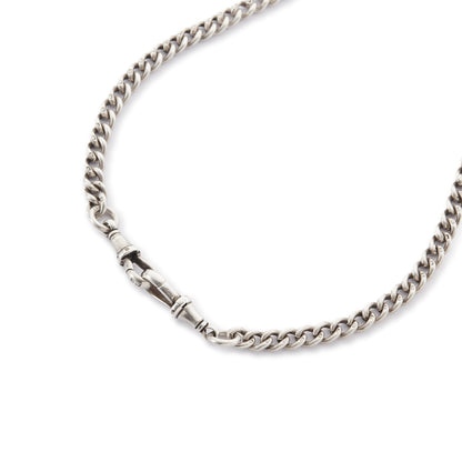 Classic Victorian sterling silver curb-link fob chain with an ornate medallion, a t-bar and two dog-clips.