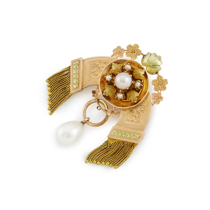 Beautifully engraved rose and yellow gold tassel pendant set with a cultured saltwater pearl, four seed pearls and a dangling teardrop pearl. The pendant has ornate flower detail and two loops at the back to thread the pendant through a chain.