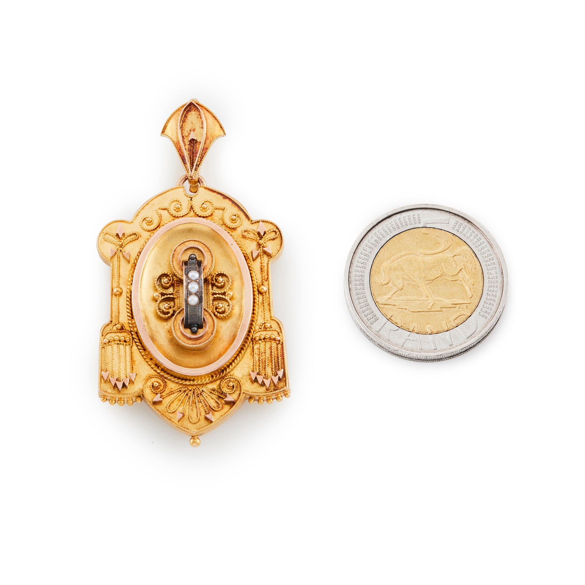 Stunning Victorian Etruscan style 18ct gold locket, with three seed pearls in an oxidised silver setting. Locket opens at the back of the pendant, with original glass and is suitable for a photo.