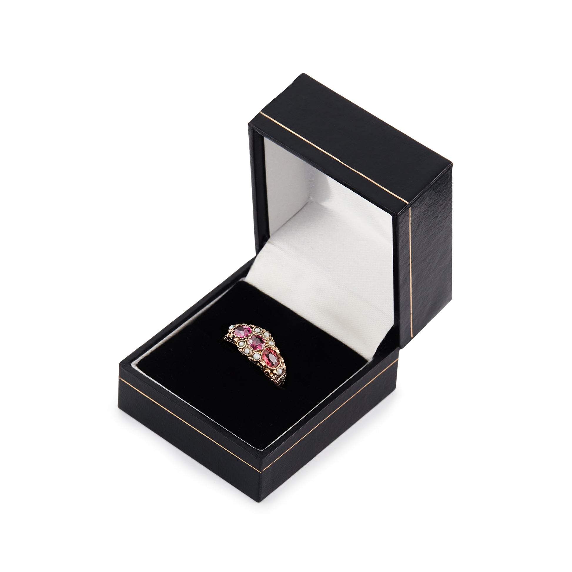 Pretty Victorian 9ct rose gold ring, set with three purple-pink garnets and eight small seed pearls. Beautiful engraving on shank.