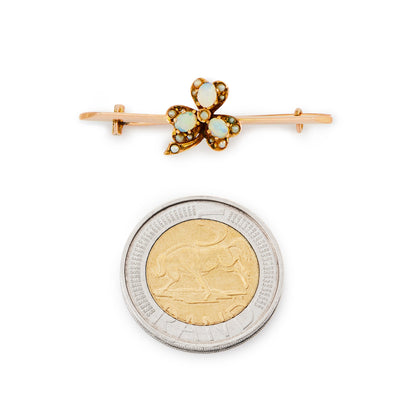 Quaint Victorian 9ct rose gold brooch with opal cabochons and seed pearls in the shape of a three leaf clover.