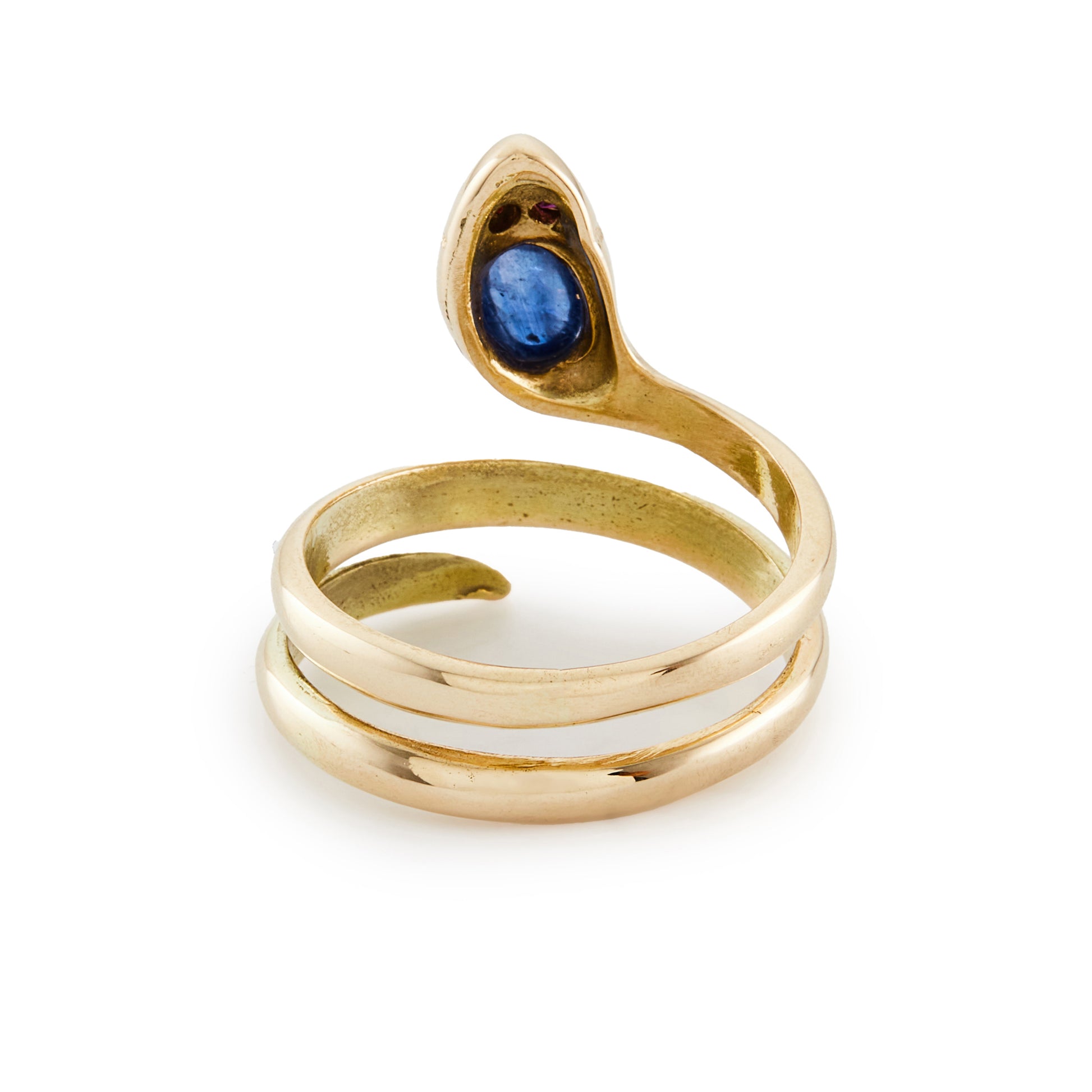 Charming vintage 12ct gold serpent ring, with a cabochon sapphire head and ruby eyes.