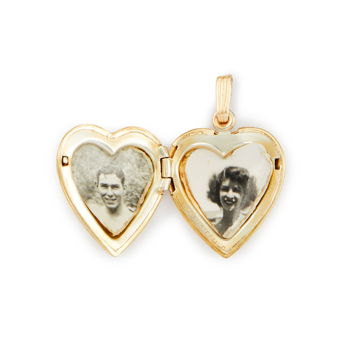 Quaint vintage 12ct gold on sterling silver heart locked with beautiful floral engraving and the initial B. The locket holds two photographs.
