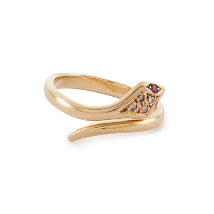 Gorgeous vintage 18ct gold serpent ring set with four diamonds in the head and ruby eyes. The ring is open, so the ring size is easily adjustable. Italy