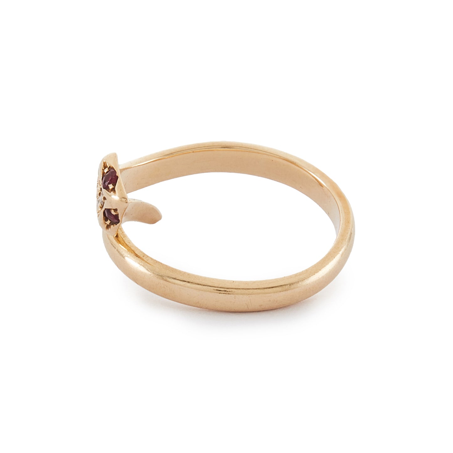 Gorgeous vintage 18ct gold serpent ring set with four diamonds in the head and ruby eyes. The ring is open, so the ring size is easily adjustable. Italy