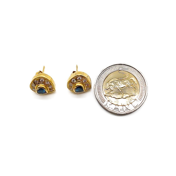 Stunning vintage 18ct gold heart stud earrings, each set with a heart-shaped sapphire surrounded by diamonds.