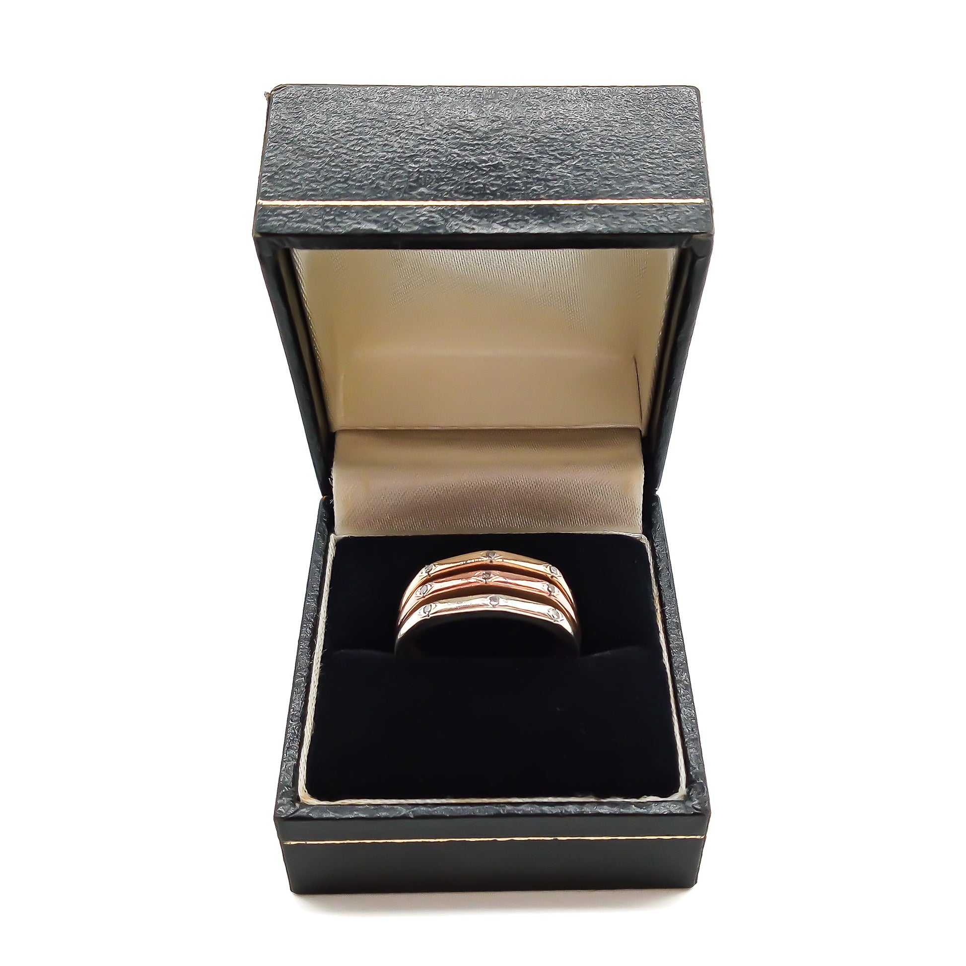 Elegant vintage 18ct yellow, white and rose gold ring set with nine small diamonds.