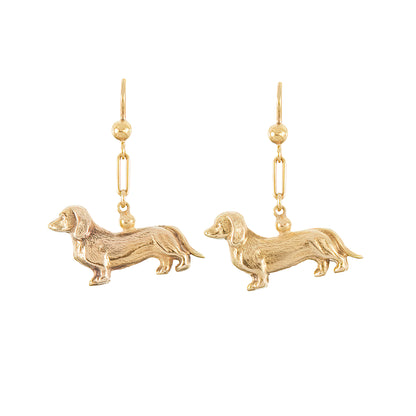 Adorable vintage 9ct yellow gold earrings consisting of two dangling sausage dogs with intricate detail.