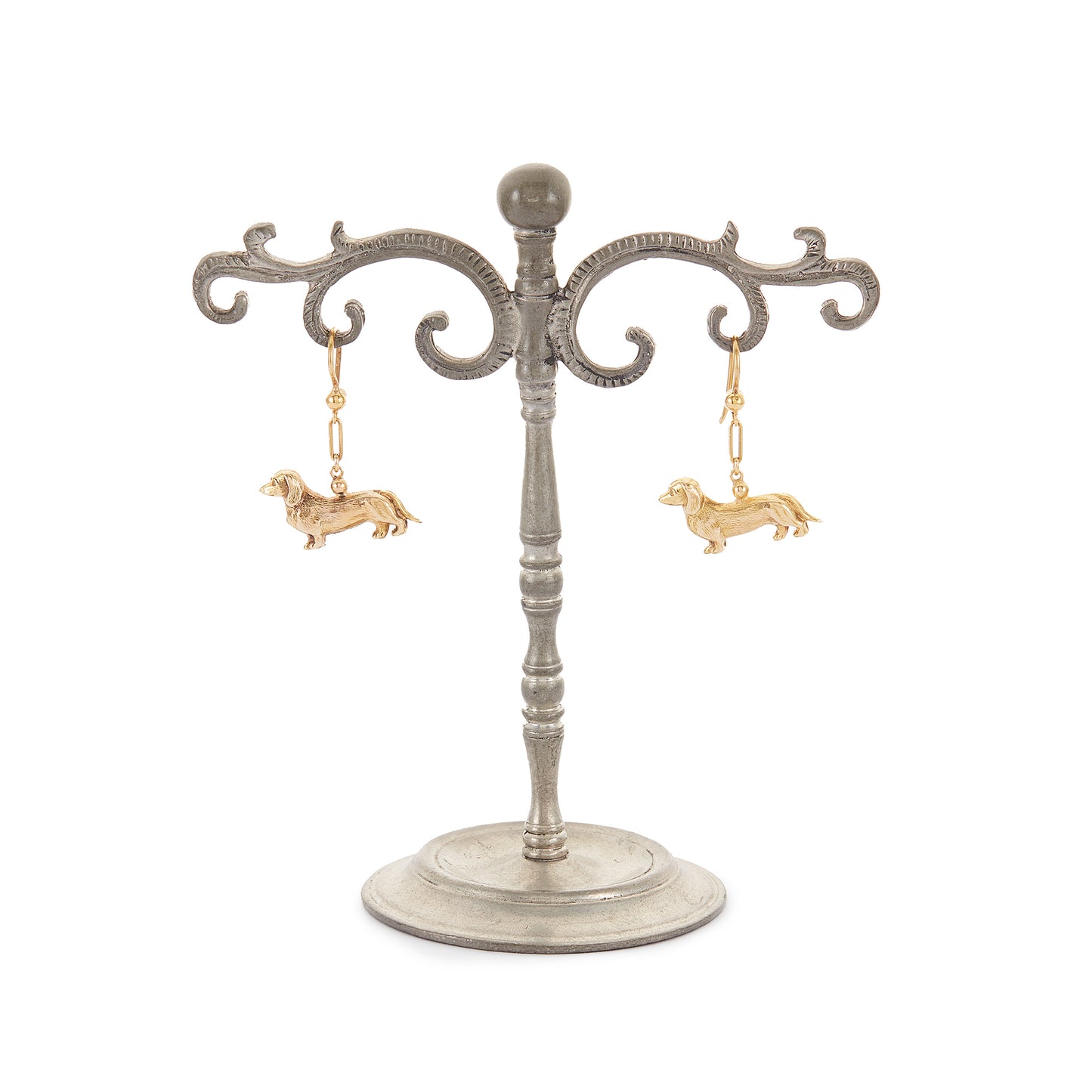 Adorable vintage 9ct yellow gold earrings consisting of two dangling sausage dogs with intricate detail.