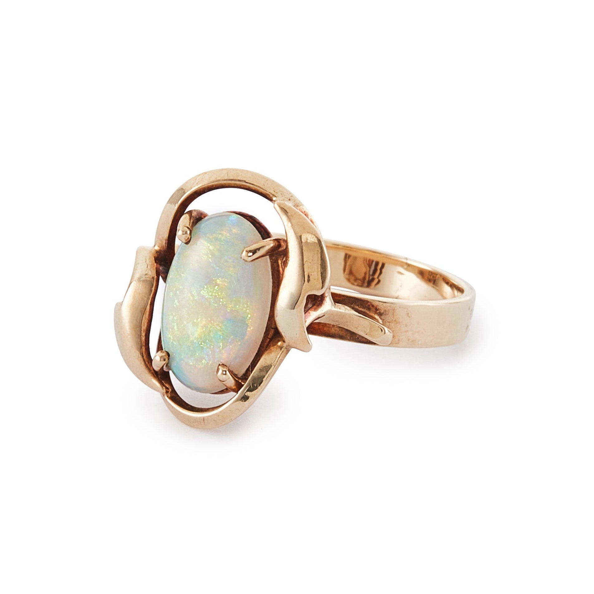 Lovely vintage 9ct gold ring set with a luminous fire opal that exudes vibrant hues of green, blue and orange.