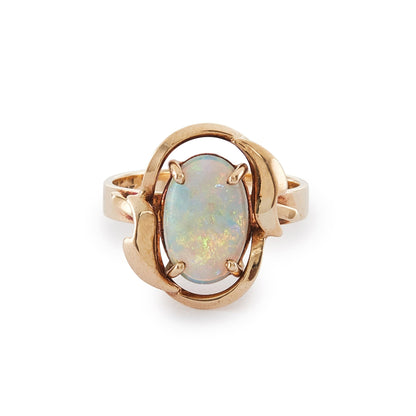 Lovely vintage 9ct gold ring set with a luminous fire opal that exudes vibrant hues of green, blue and orange.