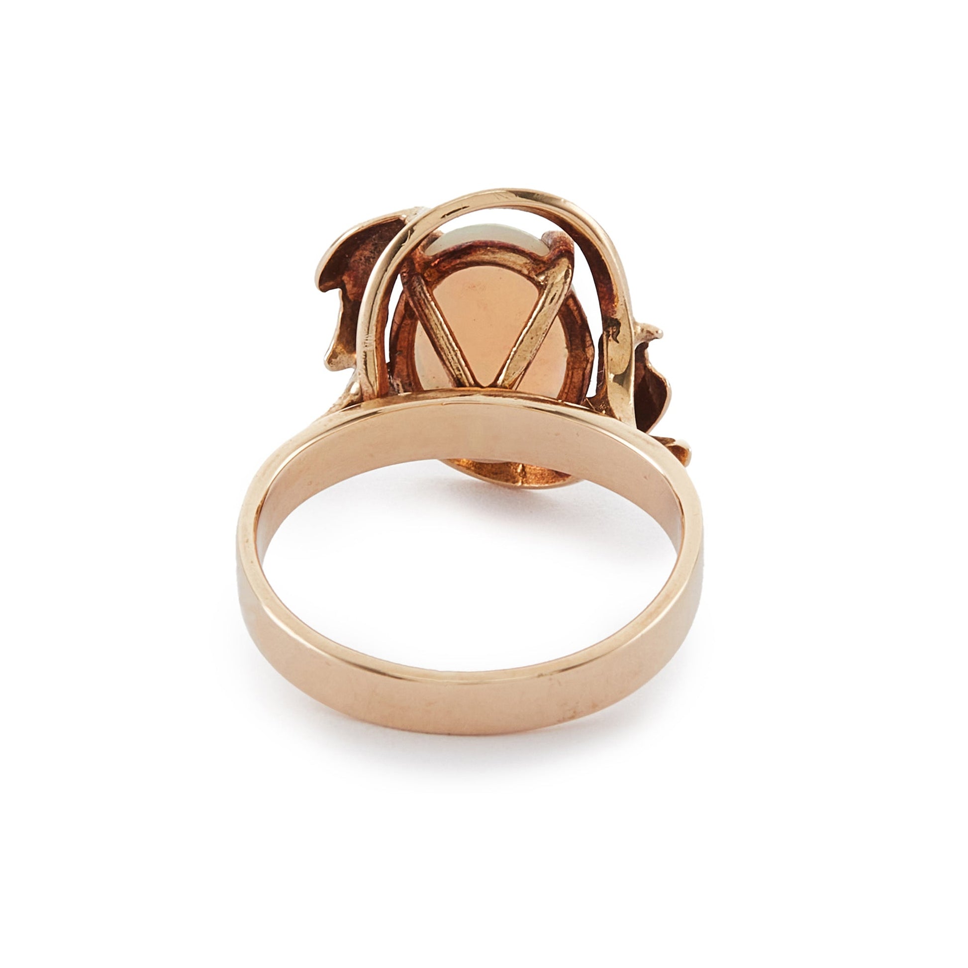 Lovely vintage 9ct gold ring set with a luminous fire opal that exudes vibrant hues of green, blue and orange.