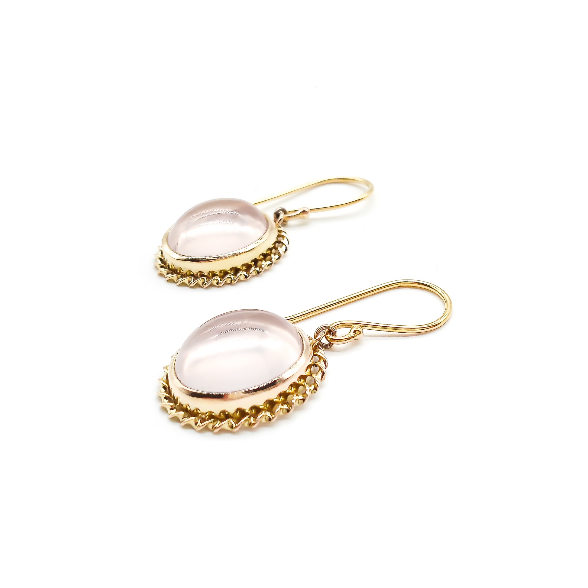 Lovely vintage 9ct yellow gold earrings, each set with a light pink cabochon rose quartz stone. 