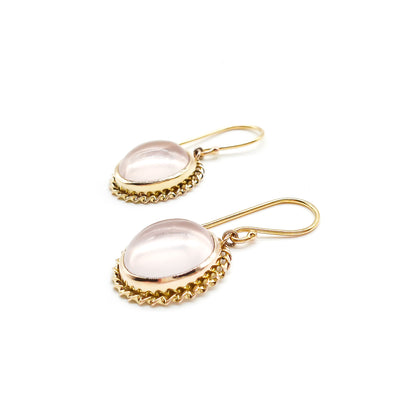 Lovely vintage 9ct yellow gold earrings, each set with a light pink cabochon rose quartz stone. 