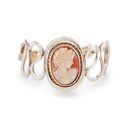 Beautifully handcrafted vintage designer sterling silver bangle with a classic cameo in a 9ct rose gold frame and 9ct rose gold beads at the opening. Will fit most wrists.