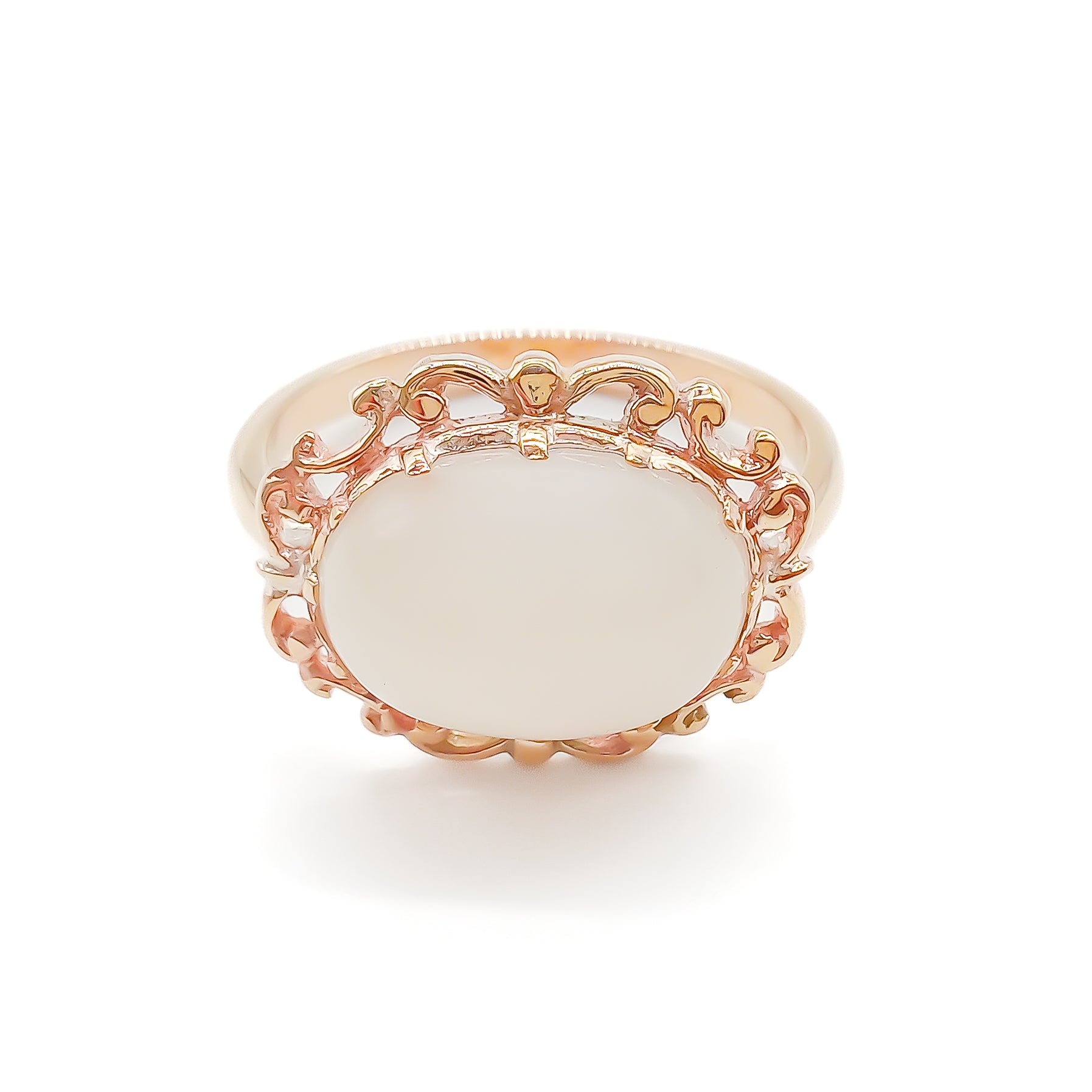 Vintage oval moonstone in a beautiful ornate rose gold ring setting.