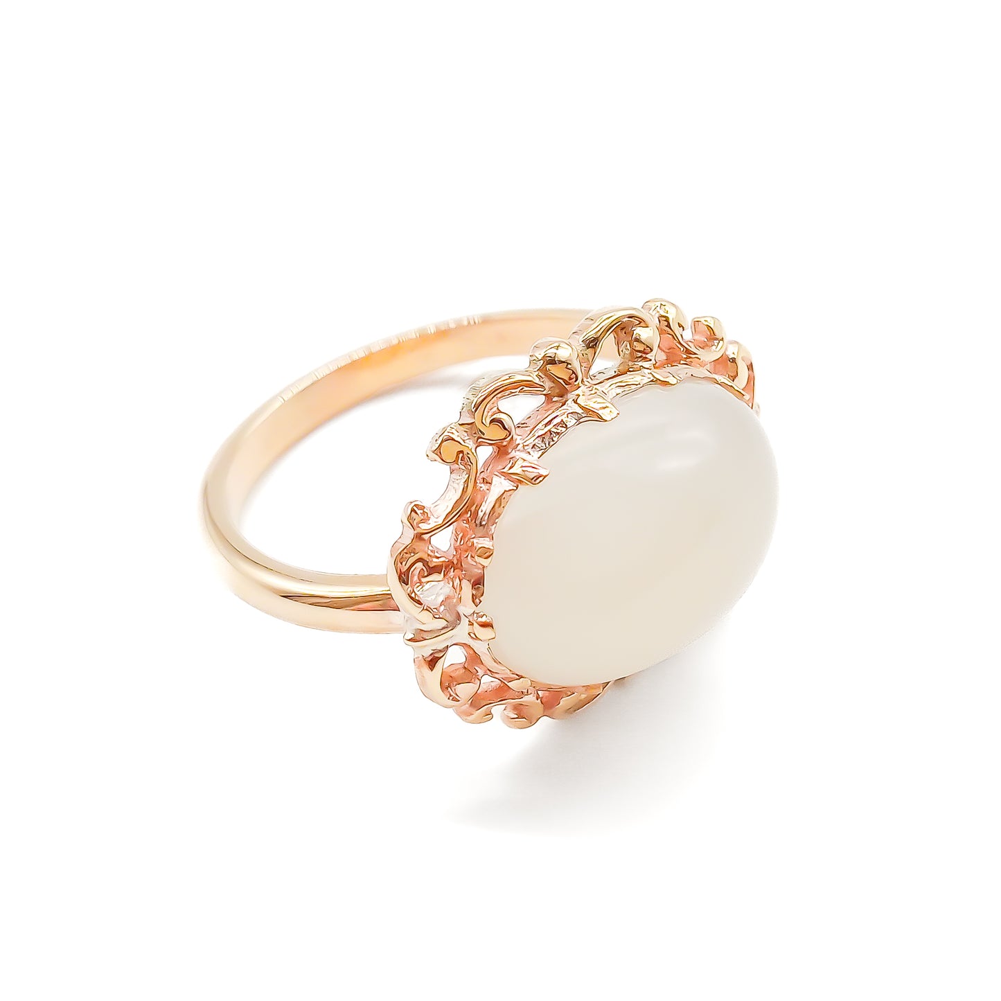 Vintage oval moonstone in a beautiful ornate rose gold ring setting.