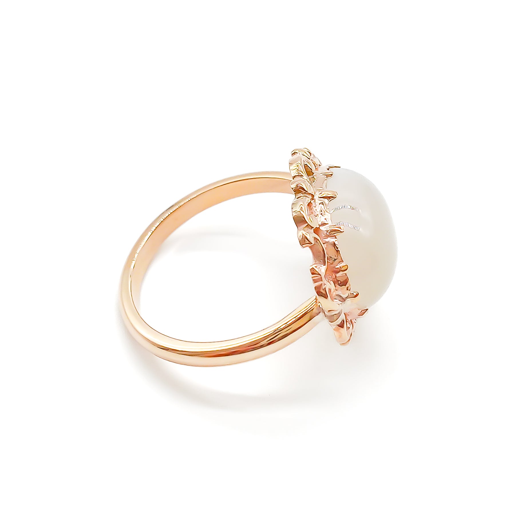 Vintage oval moonstone in a beautiful ornate rose gold ring setting.