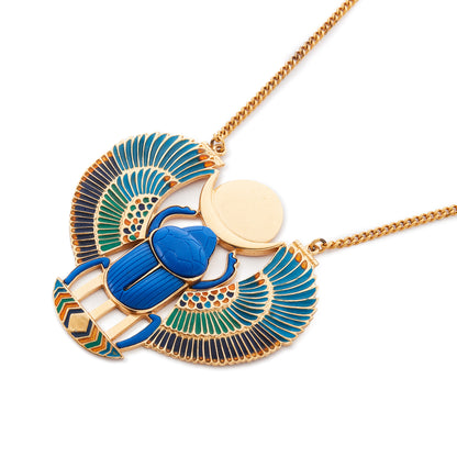 Unusual vintage Egyptian Revival necklace set with a large resin scarab that has colourful enamel detail on the wings. Gold-plated on base metal.