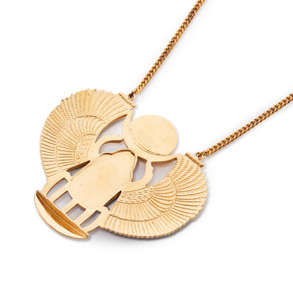 Unusual vintage Egyptian Revival necklace set with a large resin scarab that has colourful enamel detail on the wings. Gold-plated on base metal.
