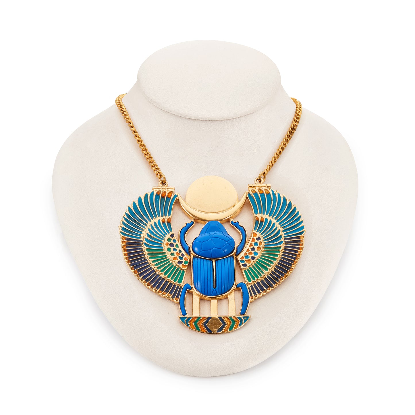 Unusual vintage Egyptian Revival necklace set with a large resin scarab that has colourful enamel detail on the wings. Gold-plated on base metal.
