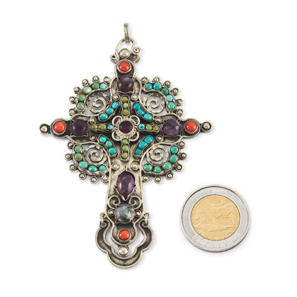 Exquisite Matl-style vintage sterling silver Mexican cross pendant with cabochon turquoise, coral, amethyst and moonstones. The cross is very large.
Maker: Morales
