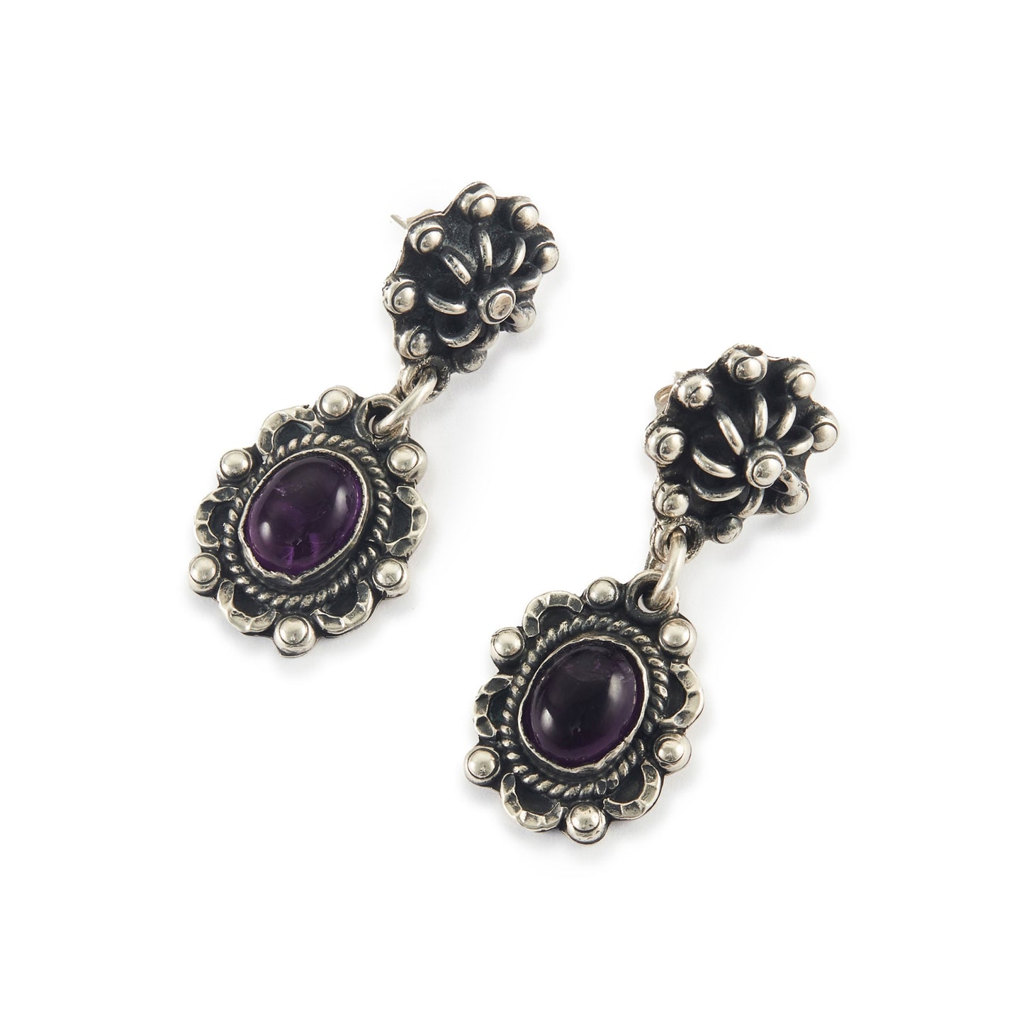 Lovely vintage oxidised sterling silver drop earrings, each set with an oval amethyst cabochon gemstone.