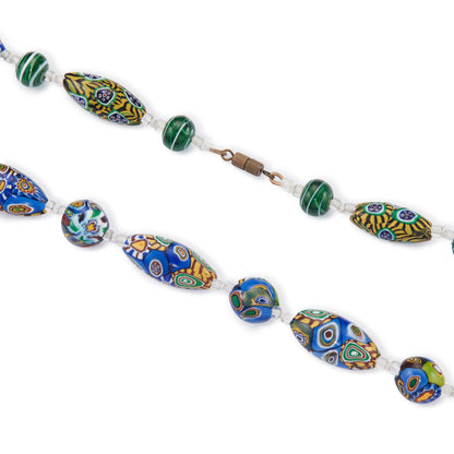 Vintage necklace made up of sought after Italian Millefiore beads, interspersed with glass lampwork and seed beads. The beads have a lovely, vibrant array of blue, green, yellow, red and brown colours.