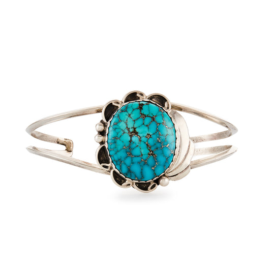 Sterling silver Native American bangle set with a beautiful oval spiderweb turquoise stone.