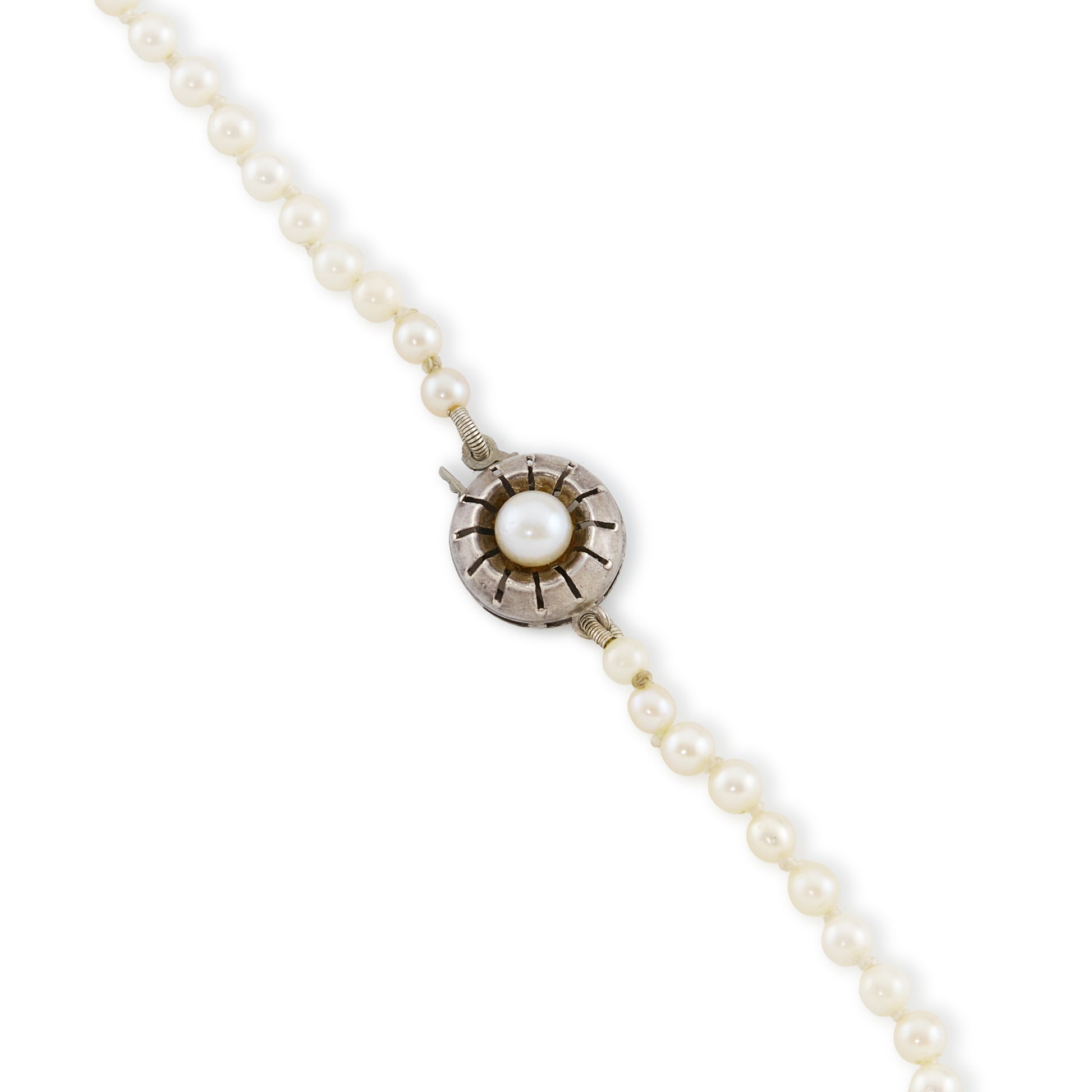 Graduated string of lustrous vintage cultured seawater pearls with sterling silver clasp set with a single pearl.