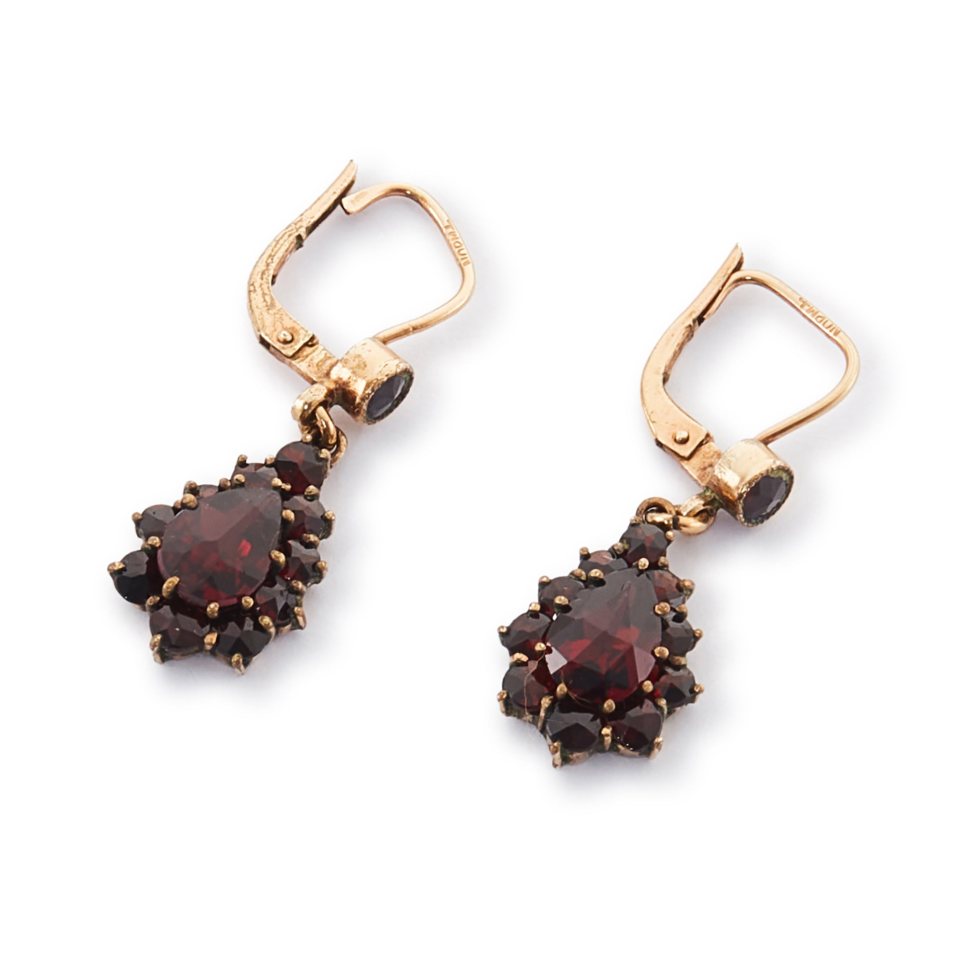 Pretty vintage dangling silver-gilt earrings set with deep red faceted garnets.