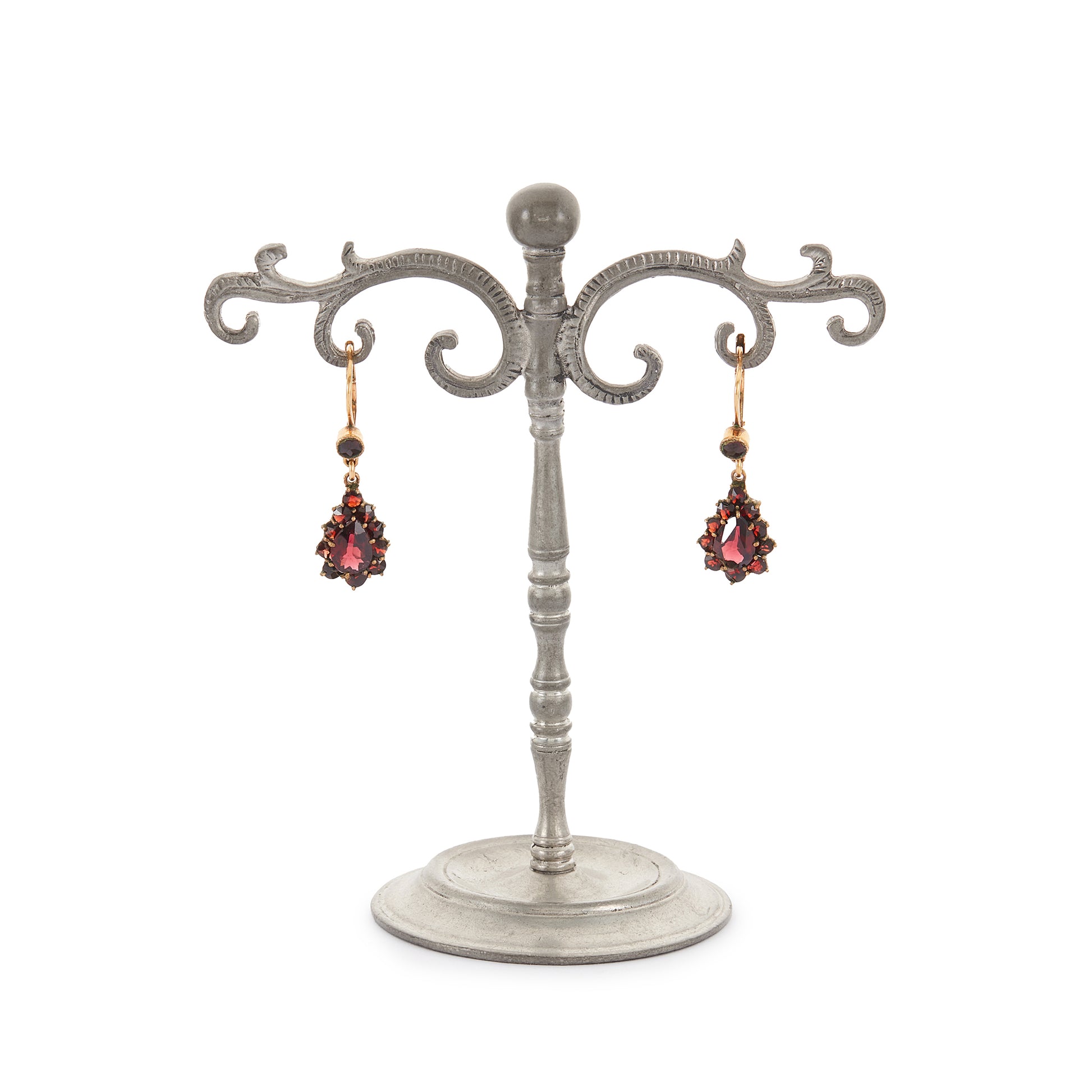 Pretty vintage dangling silver-gilt earrings set with deep red faceted garnets.