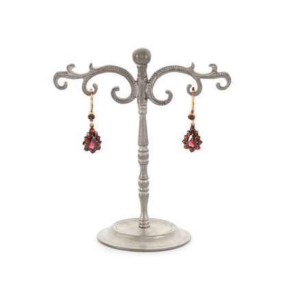 Pretty vintage dangling silver-gilt earrings set with deep red faceted garnets.